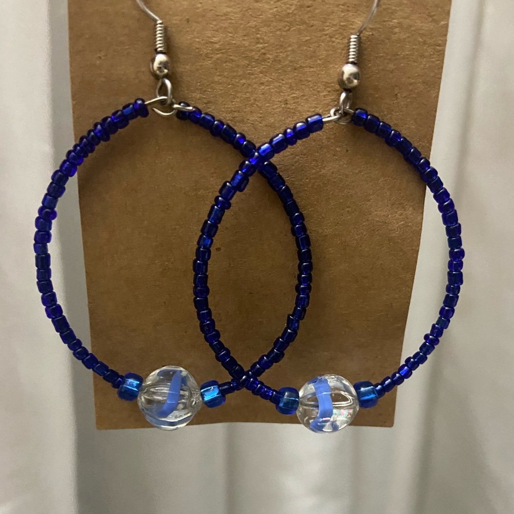 Round earrings in royal blue